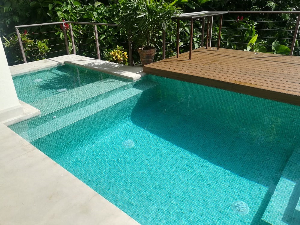 green spanish tiling, pool construction