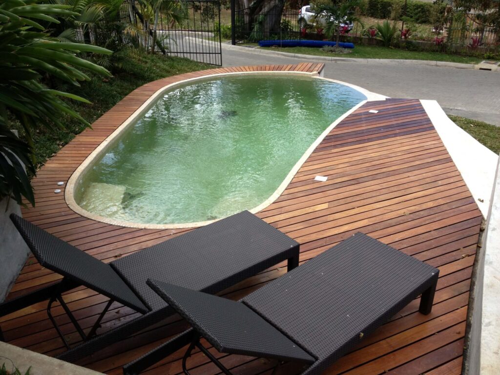 pool contractor in escazu, green tiling, designer