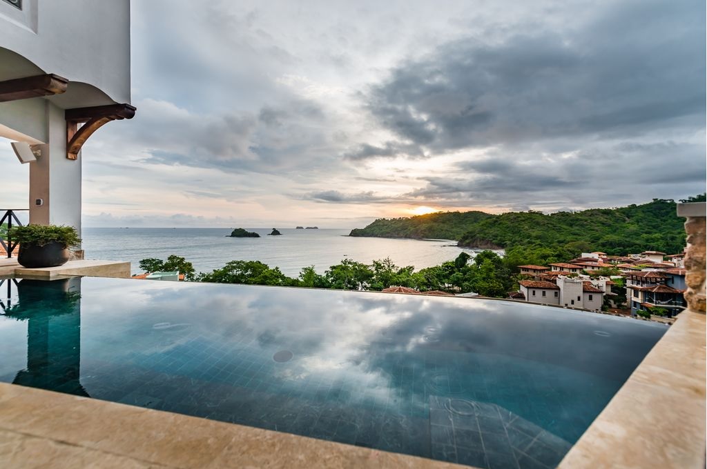 infinity edge pool, with tikal stone